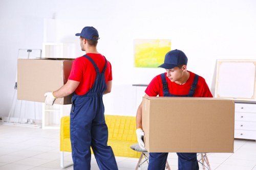 Moving boxes and furniture prepared for Staines removals