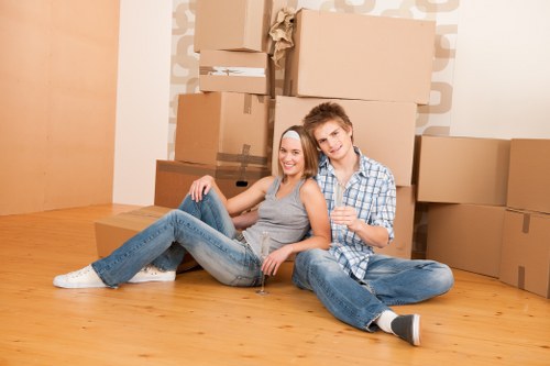 Furniture and boxes being moved in a residential area