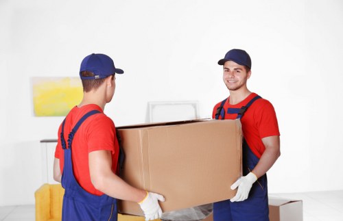 Removal team loading items for a Staines relocation
