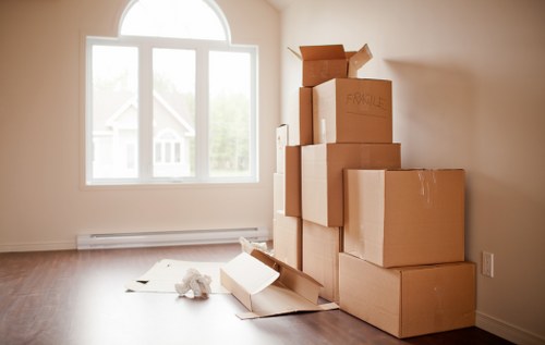 Local team removing sofas and wardrobes from a Staines property