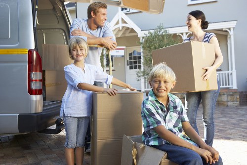 House removal team handling furniture in Staines