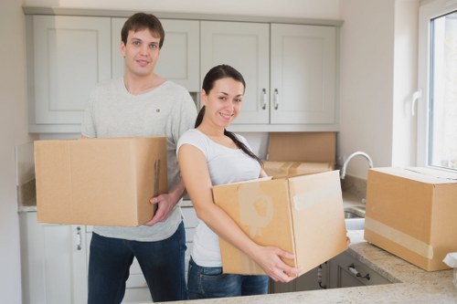Packed household boxes ready for a Staines home move